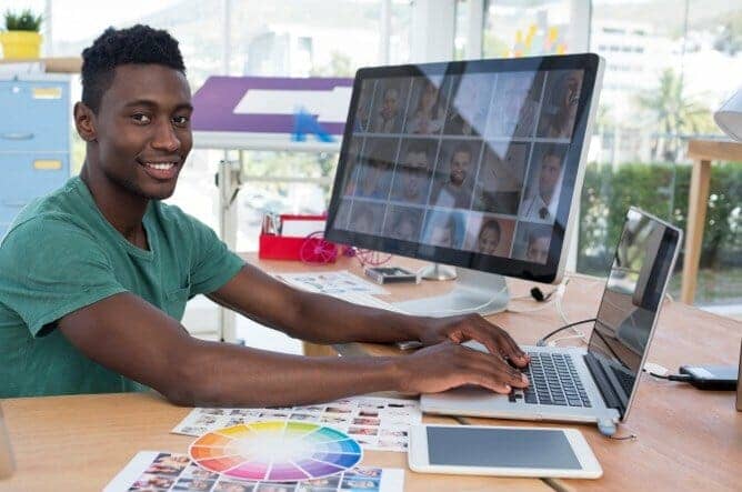 Marketing Graduate student using laptop to do homework