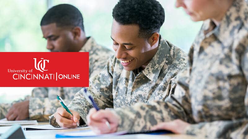 Military members writing on paper