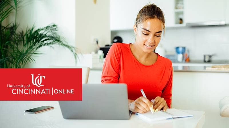 Woman in online degree program, learning at home.