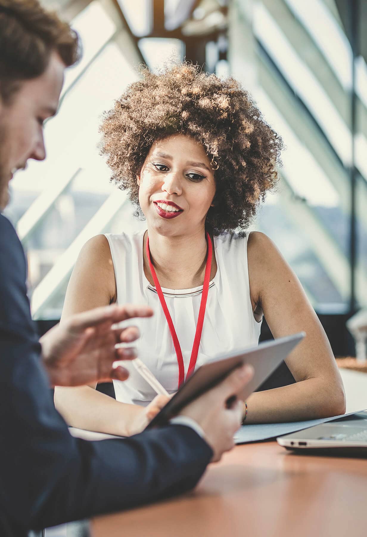 Manager working with employee