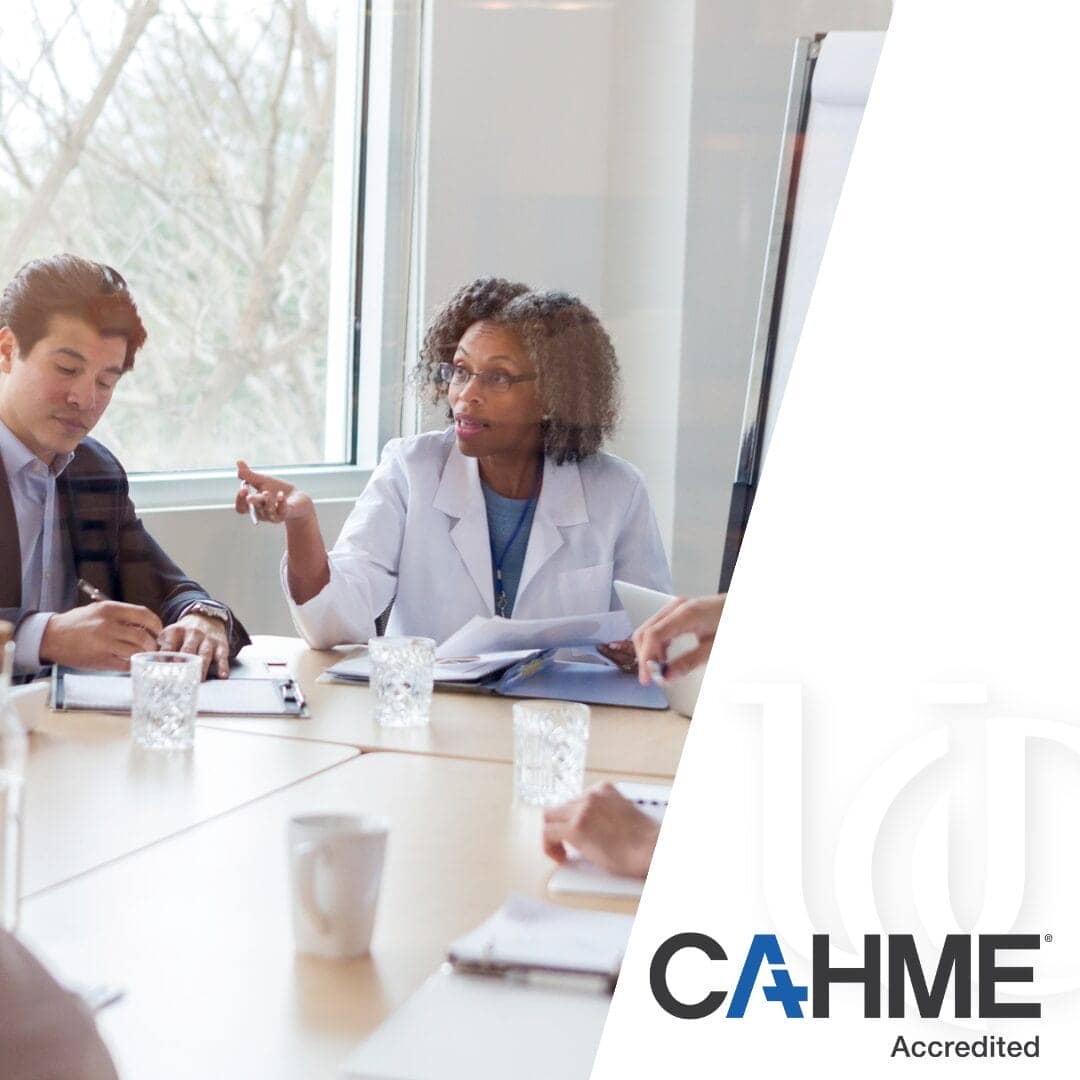 Healthcare board room image with CAHME accreditation logo.