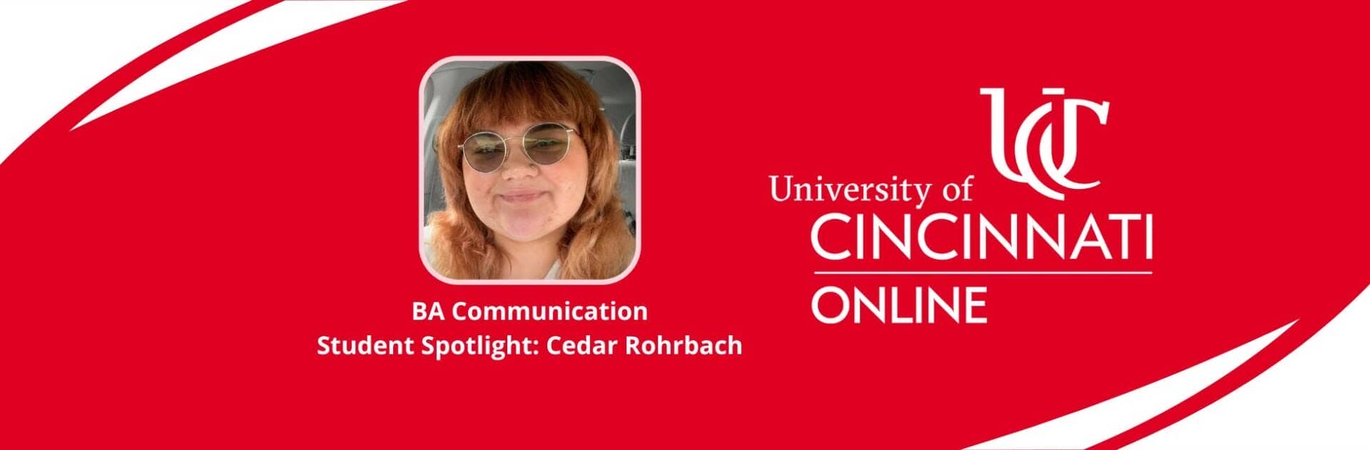 This is an image containing a headshot of our featured student, Cedar Rohrbach. They are wearing circular glasses and a t-shirt. The University of Cincinnati logo is also in this image, with a red background.
