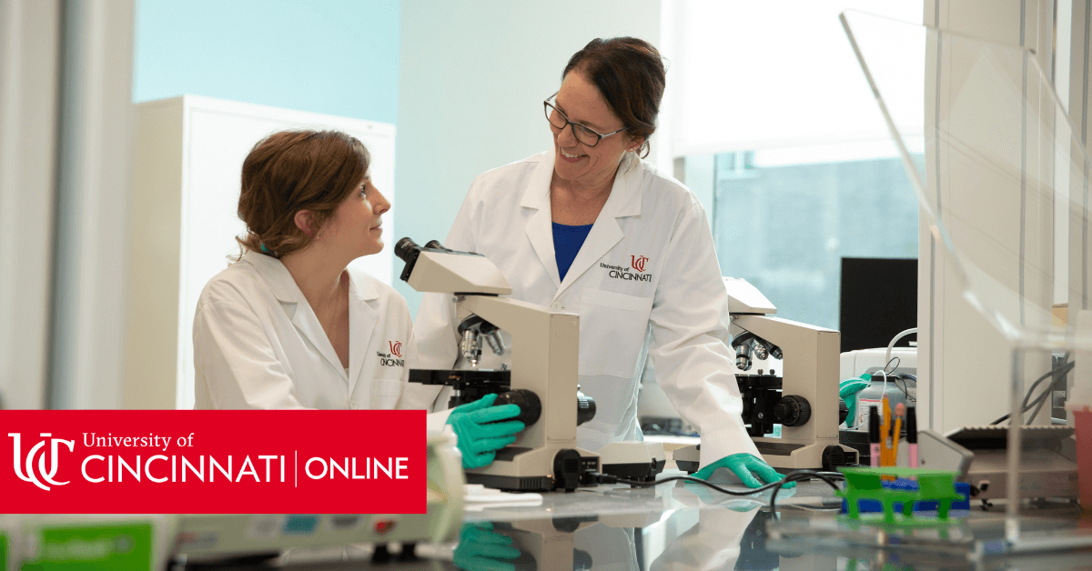 Laboratory Science Instructors teaches a student using a Microscope