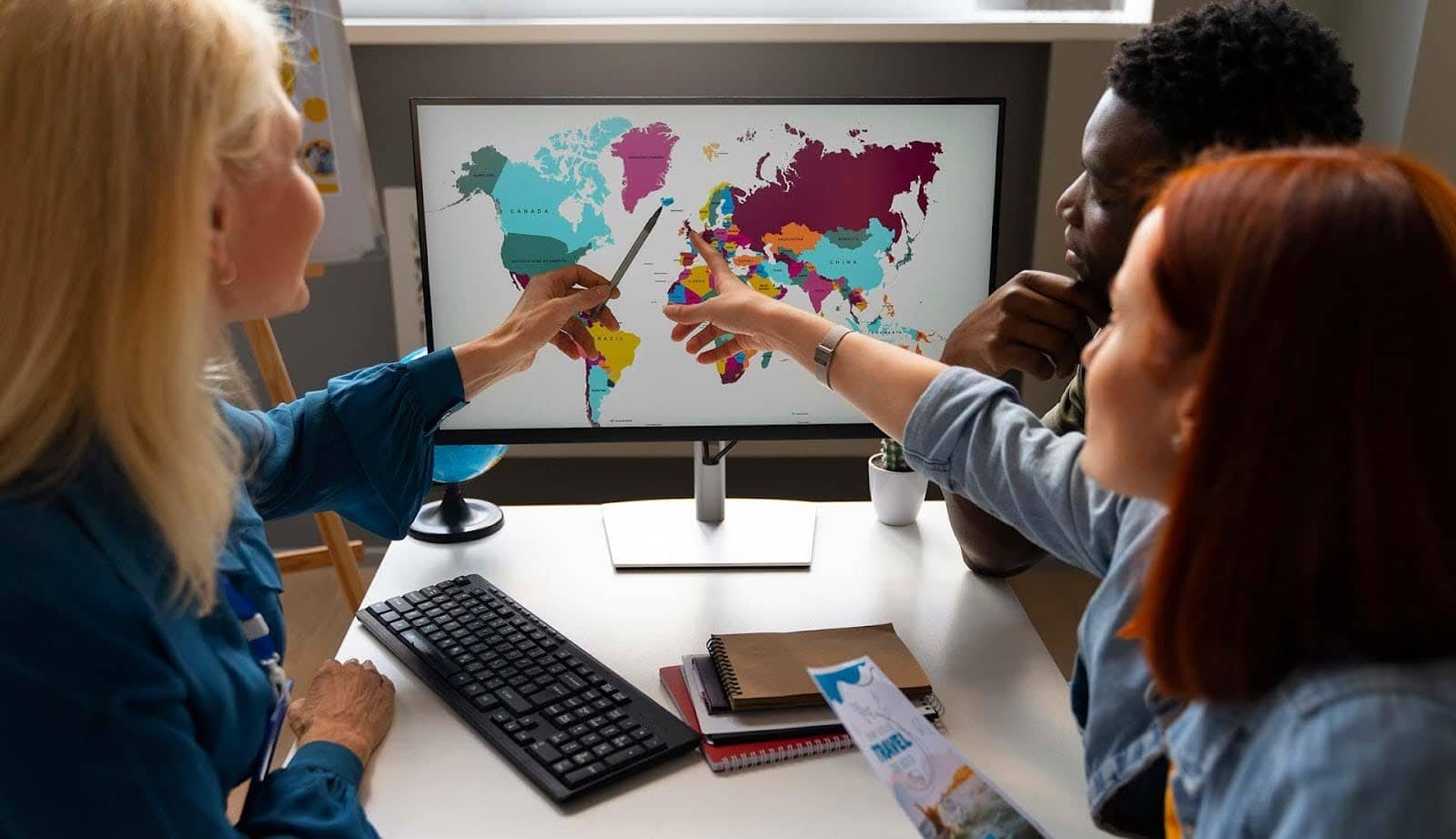 Analysts looking at a geographic information system