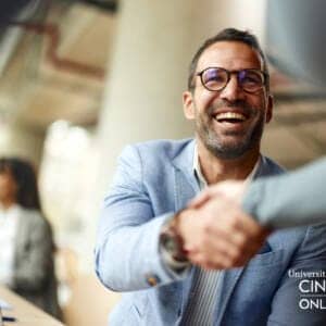 Image showing business management professionals shaking hands