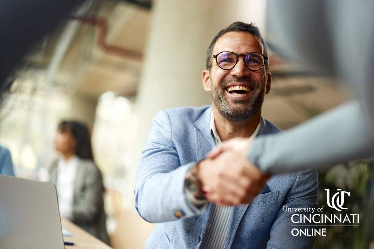 Image showing business management professionals shaking hands